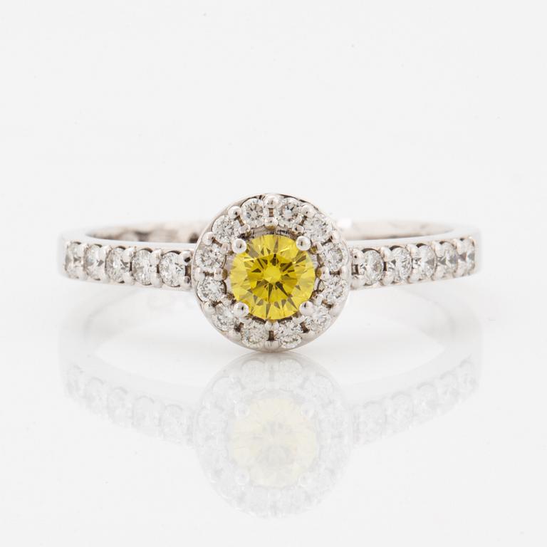 Yellow colour treated diamond and brilliant-cut diamond ring.