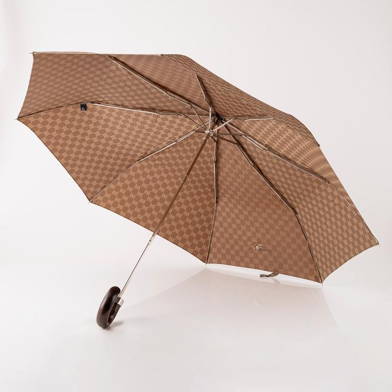 Gucci, an umbrella.
