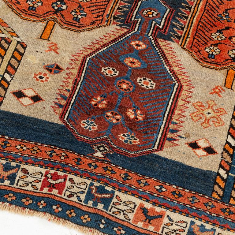 A Caucasian, antique rug, c. 225 x 125 cm.