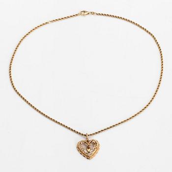 Tony Granholm, a 14K gold necklace 'Heart of the home' for Kalevala Koru, Helsinki 2002.