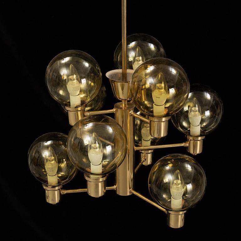 A 1960's brass and glass ceiling light.
