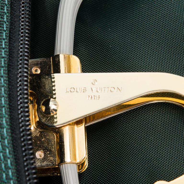 LOUIS VUITTON, TAIGA and NYLON GARMENT BAG.