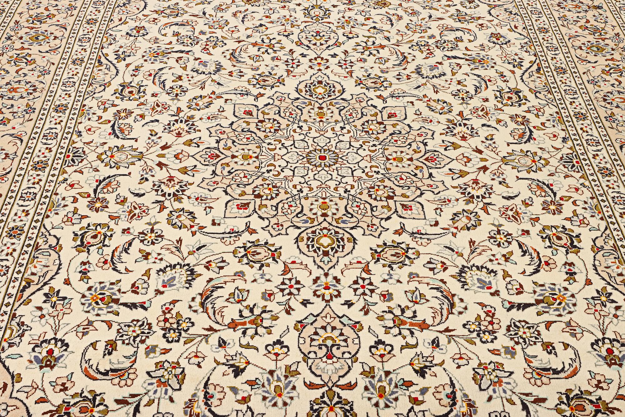 A Keshan carpet, c. 355 x 238 cm.