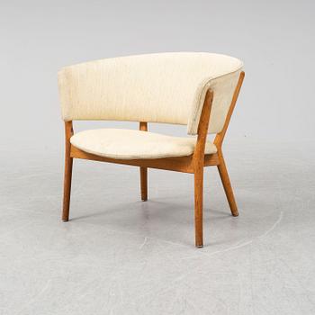 A mid 20th century "model 83" armchair designed by Nanna Ditzel, Denmark.