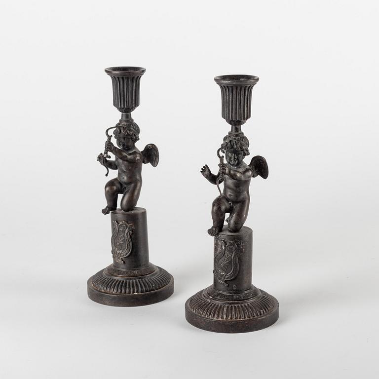 A pair of German (Berliner Eisen) Empire iron candle sticks.