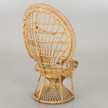 A 20th century wicker chair.