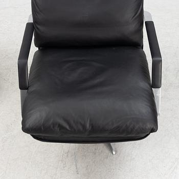 A leather 'SL 330' swivel chair and ottoman, Søren Lund, Denmark.