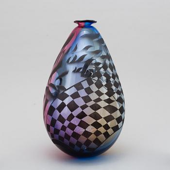 A glass vase by Kjell Engman, Kosta Boda, signed.