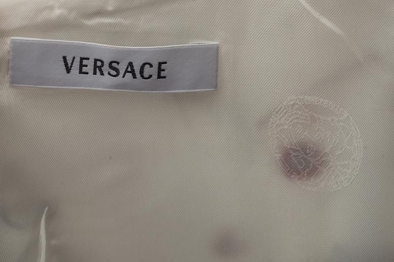 KLÄNNING, Versace.