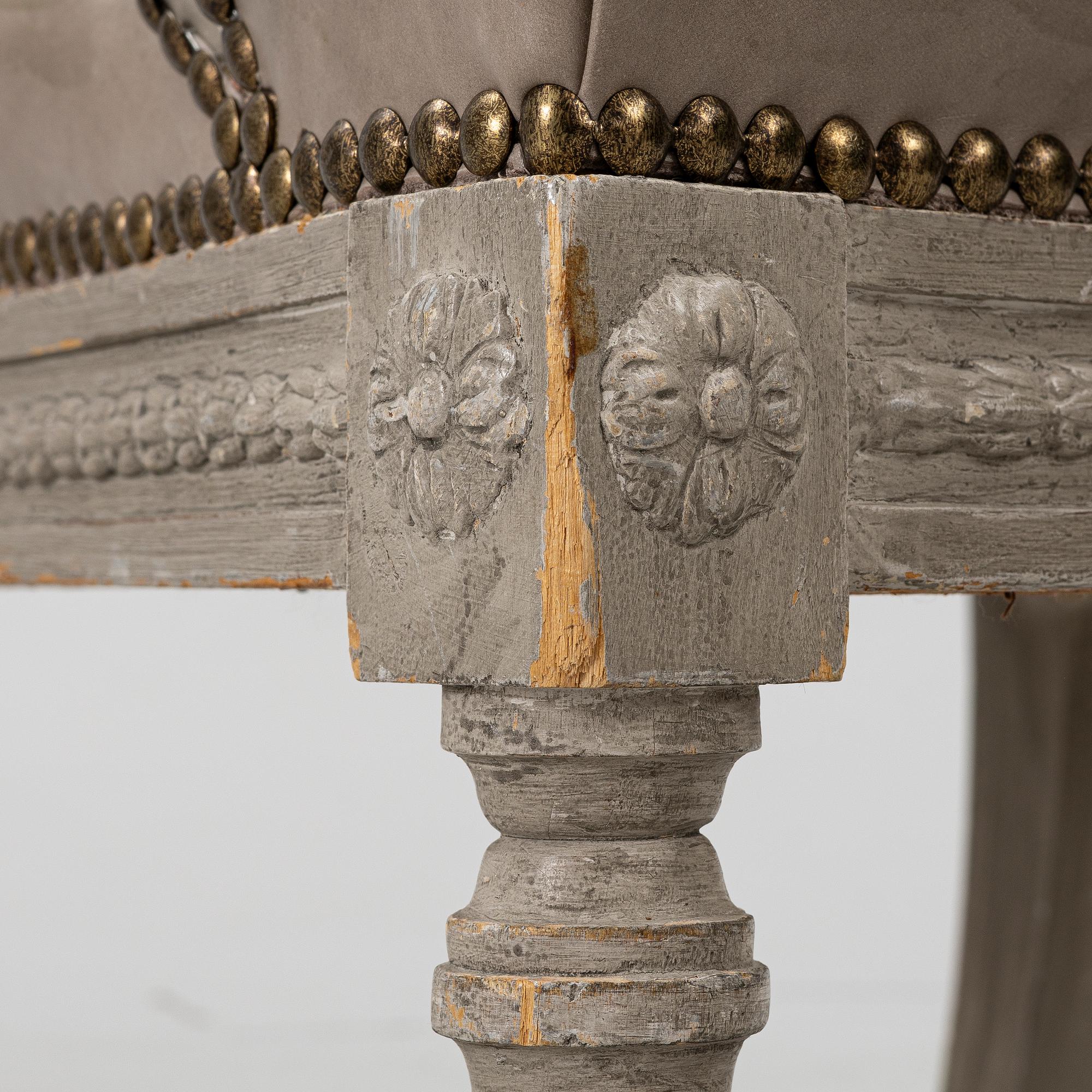 A late Gustavian style armchair, early 20th Century.