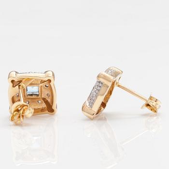 A set of 14K gold earrings and pendant with topazes and diamonds ca. 0.04 ct.
