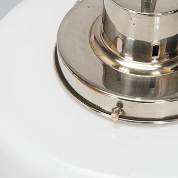 Paavo Tynell, kattovalaisin, malli 2004, Taito 1930-luku.