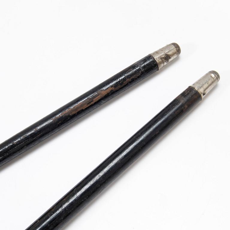 Two 1920s walking sticks with silver handles and ferrules. Finnish and Swedish control marks.
