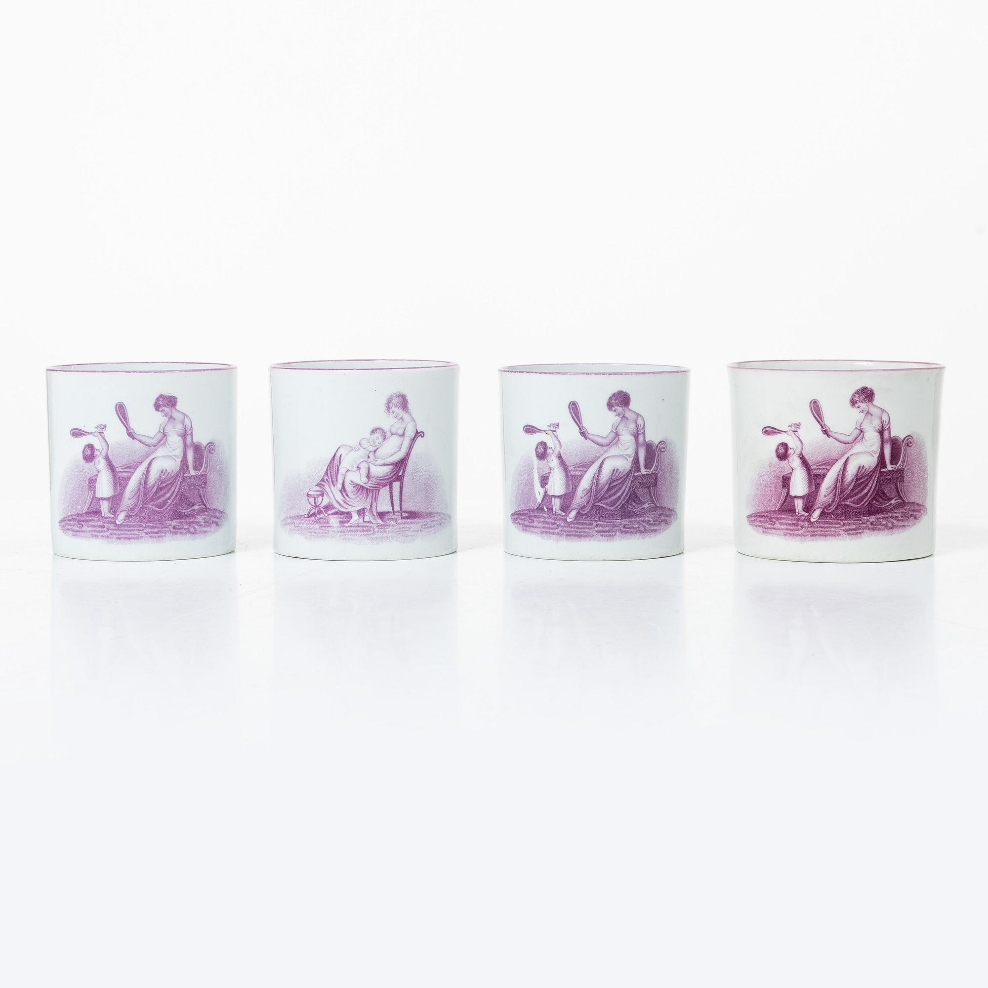 A purple camaieu part coffee service, Early 19th century.
