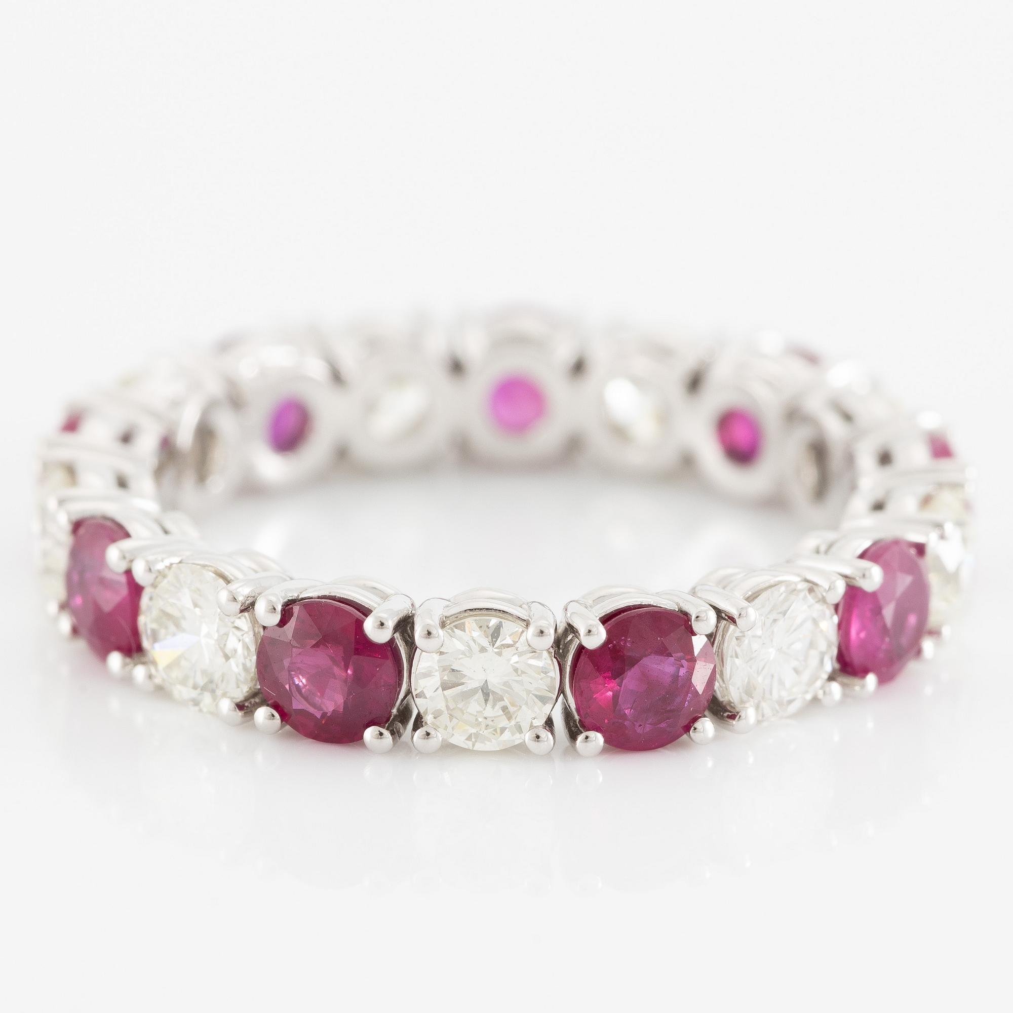 Ring, full eternity band, 18K white gold set with rubies and brilliant-cut diamonds.