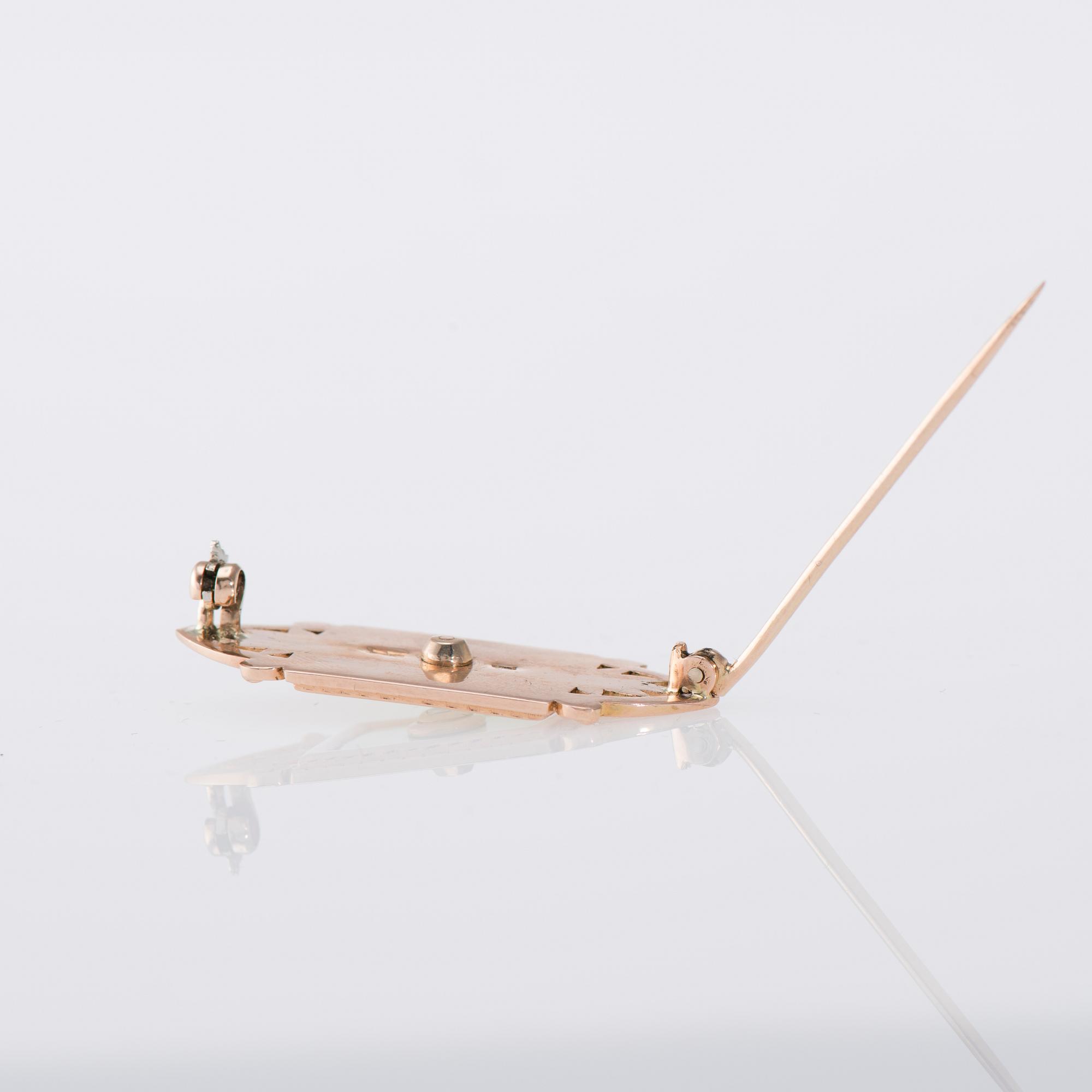 BROSCH, 14K guld, emaljering, briljantslipad diamant ca 0,12 ct. Ryska stämplar 1900-talets slut. Vikt 8,1 g.