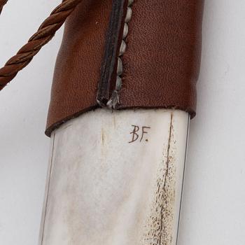 A reindeer and buffalo horn knife by Bertil Fällman, signed.