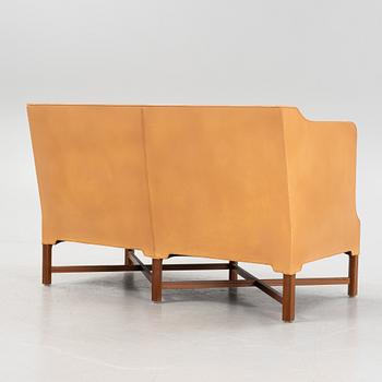 Kaare Klint, a leather upholstered model 4118 sofa, Rud Rasmusseun, Denmark, 1980's.