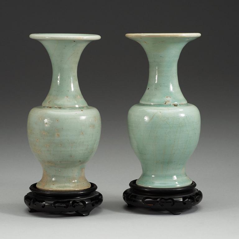 A pair of celadon glazed vases, presumably Yuan/Ming dynasty.