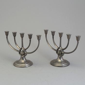 A pair of pewter candelabra from GAB, first half of the 20th century.