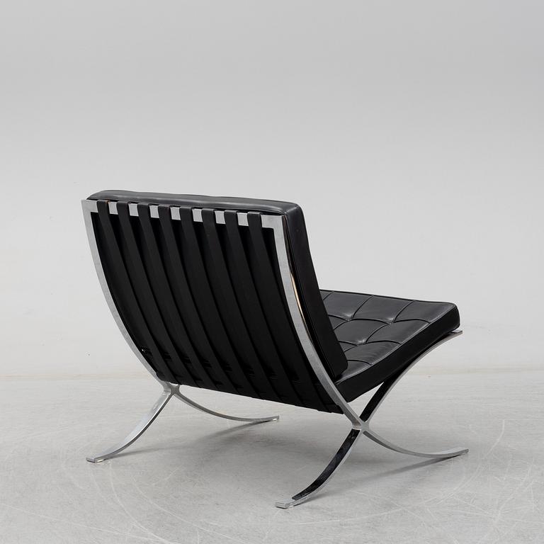 LUDWIG MIES VAN DER ROHE, a 'Barcelona' black leather lounge chair, Knoll Studio.