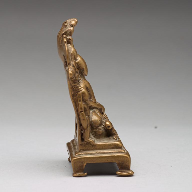 A copper alloy Jain shrine, western India, 19th Century or older. With inscription to the back.