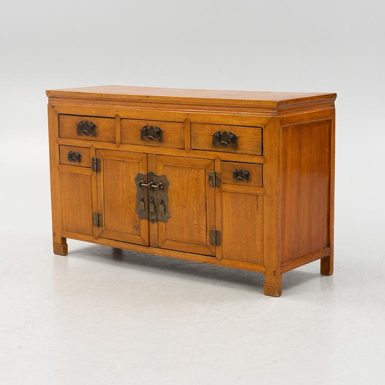A hardwood sideboard, China, around 1900.