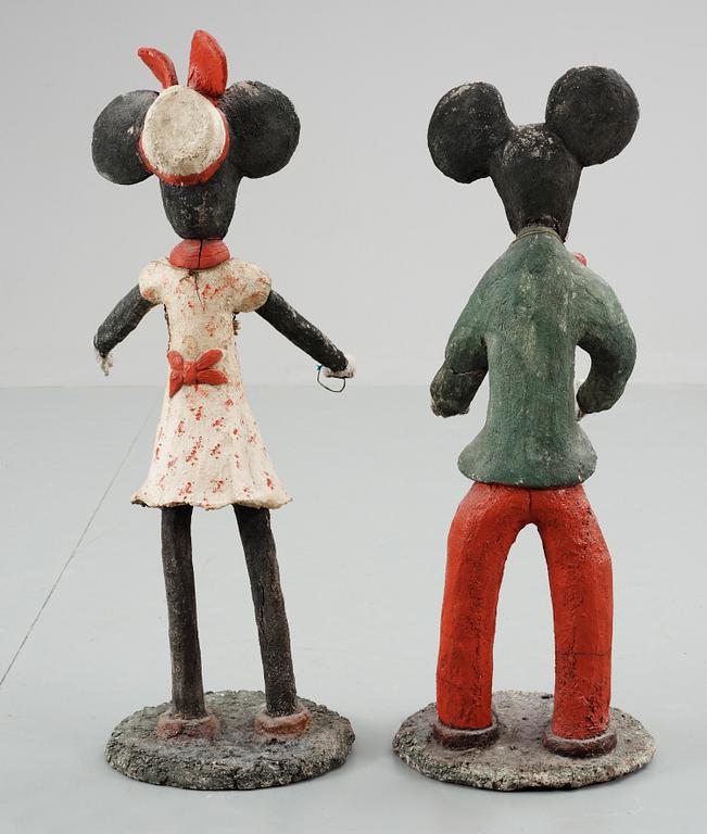 A pair of concrete sculptures of Mickey and Minnie Mouse, 20th century.