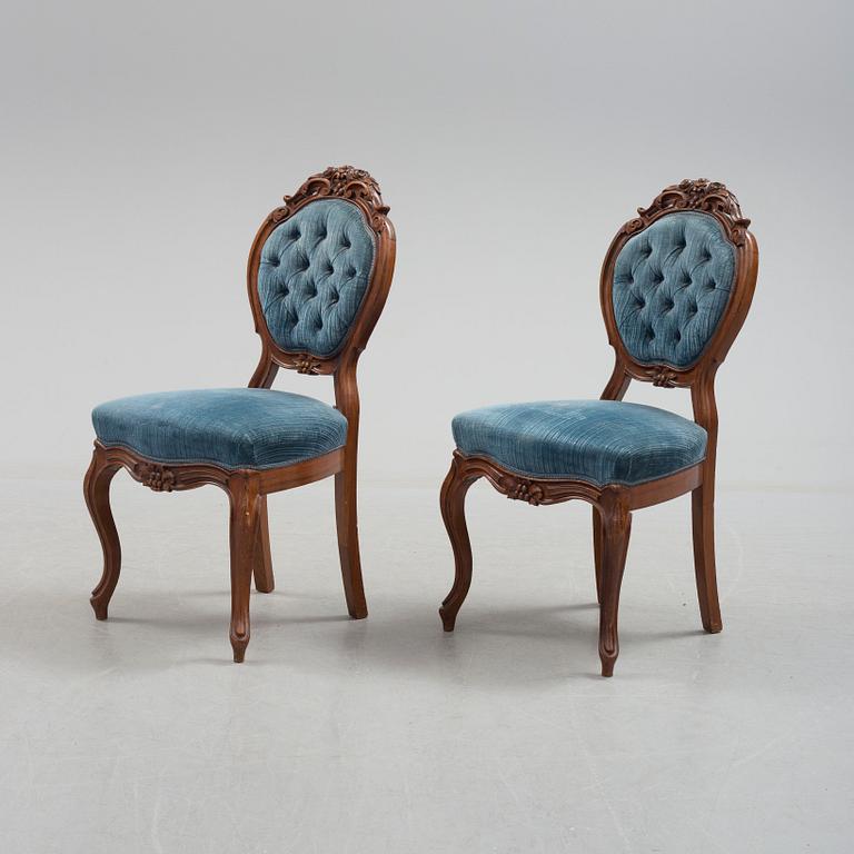 Six late 19th century walnut chairs.