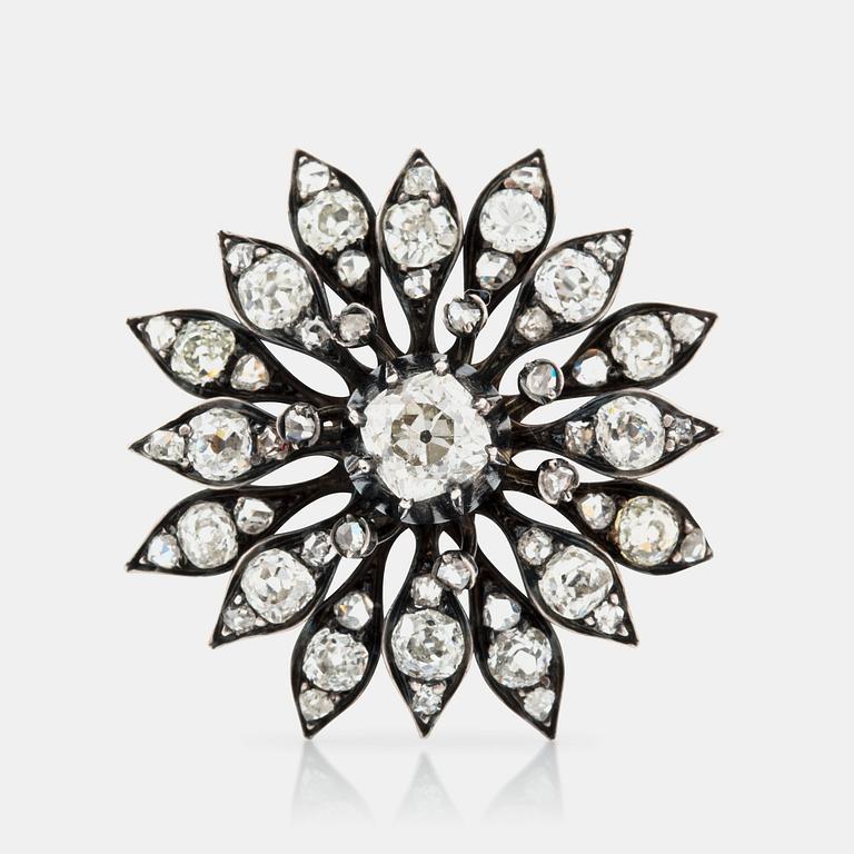 BROSCH med gammalslipade diamanter totalt ca 3.00 ct i form av en blomma. Cirka 1880-tal.