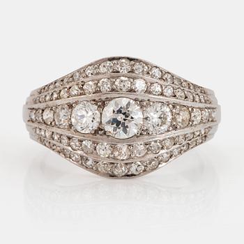 An 18K white gold ring set with old- and eight-cut diamonds.