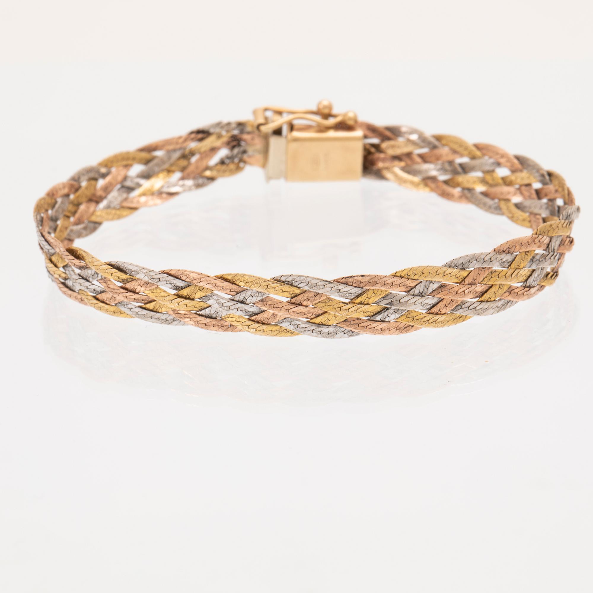 A 14K gold bracelet.