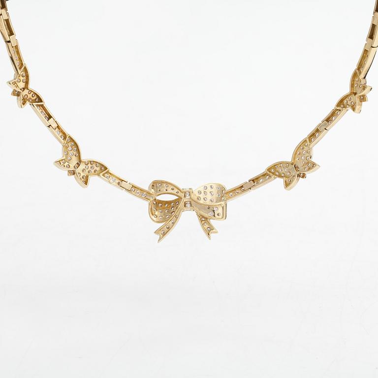 An 18K gold necklace, with brilliant- and baguette-cut diamonds totaling approx. 4.44 ct.