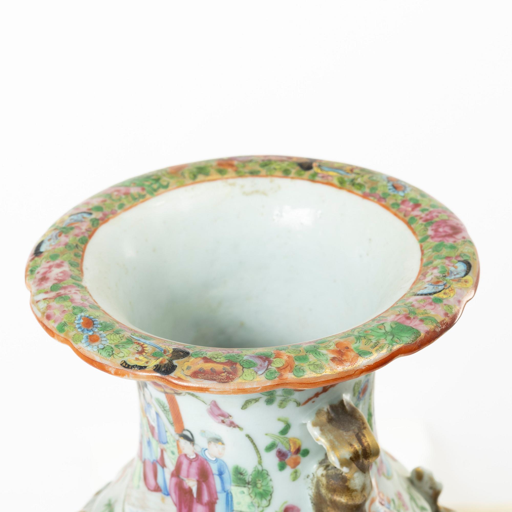 A famille rose vase with cover and a vase, Qing dynasty, Kanton, 19th century.