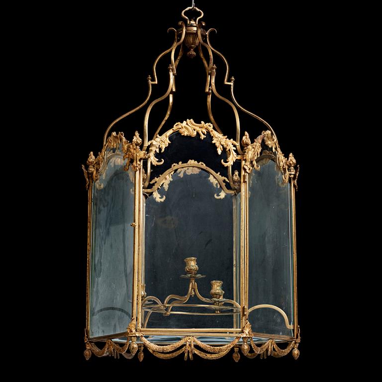 A Swedish rococo gilt-brass four-light lantern, possibly a masterpiece, Stockholm, later part of the 18th century.