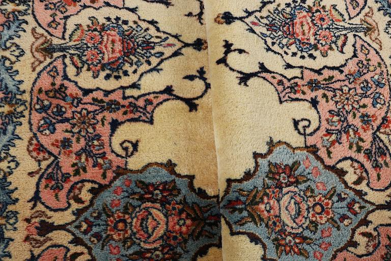 A carpet, old Kerman, ca 370 x 270 cm.