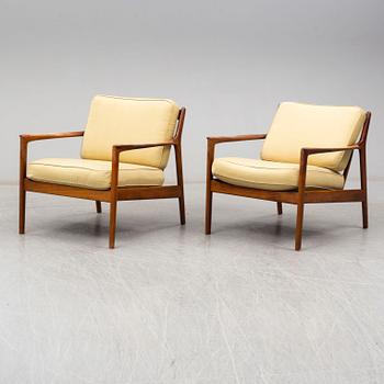 A pair of USA-75 easy chairs by Folke Ohlsson, DUX.