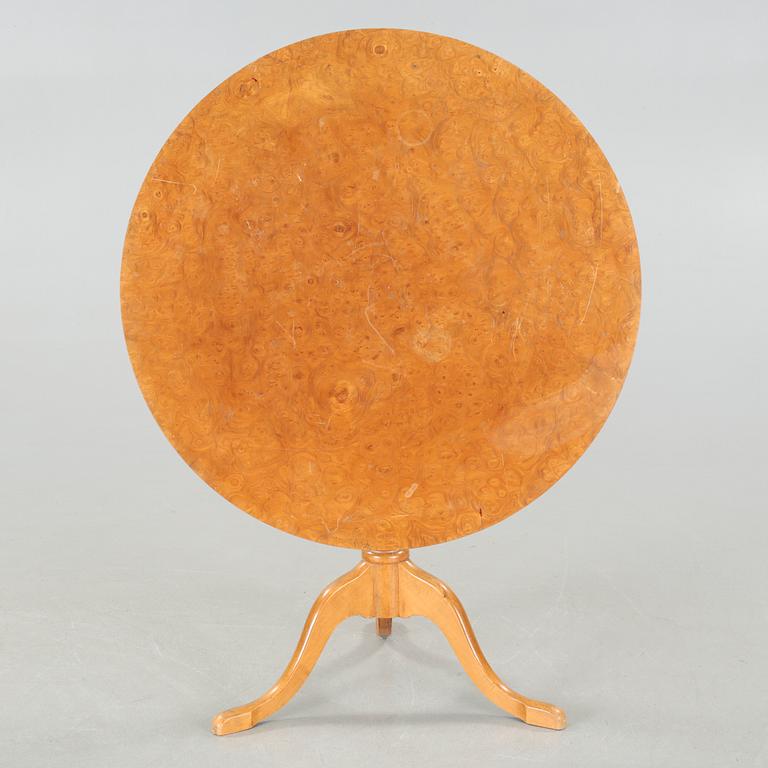 A folding table, made in the first half of the 20th century.
