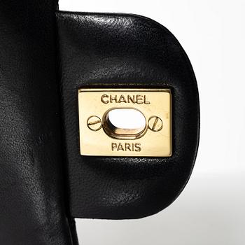 Chanel, A black leather 'Double Flap Bag Small'.