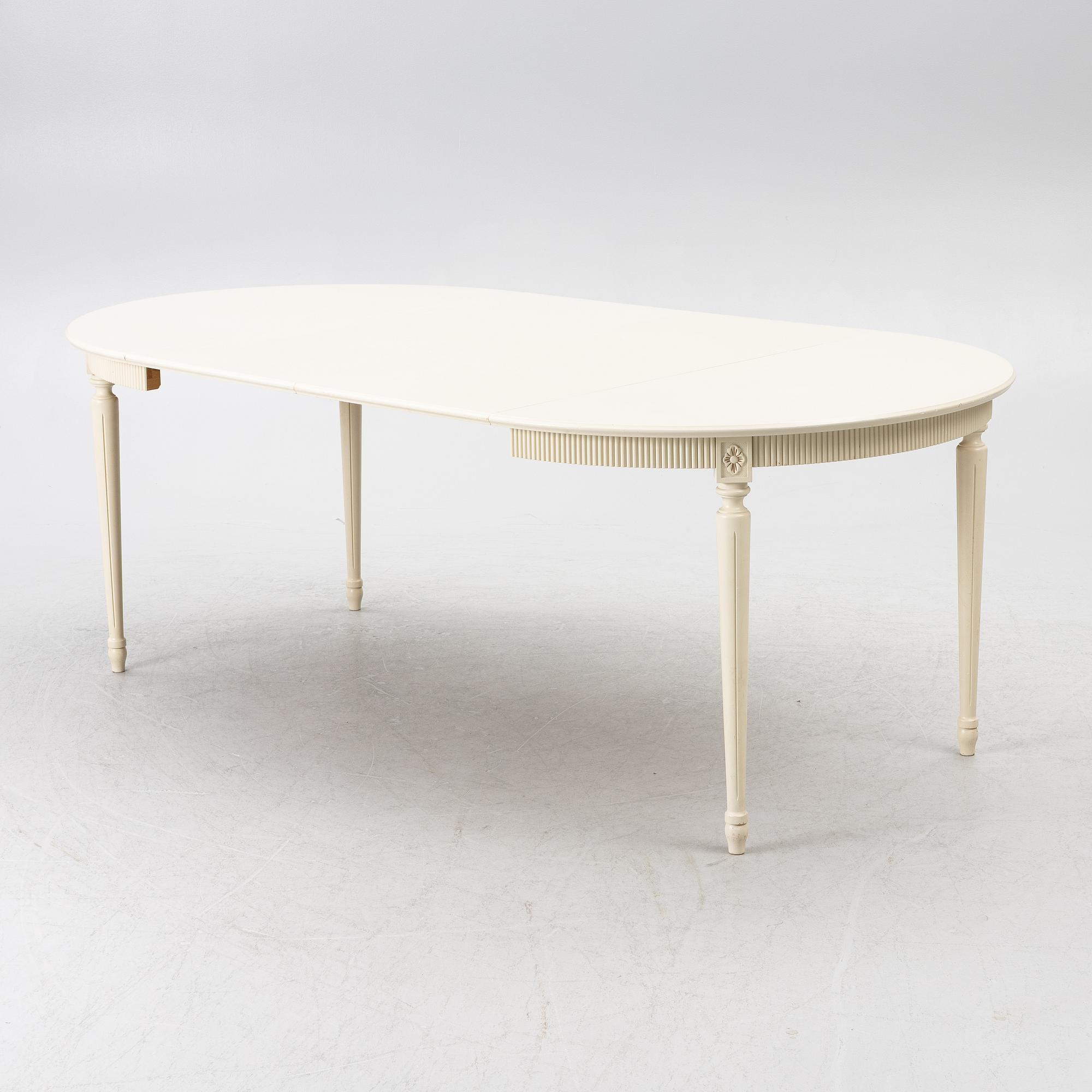 Dining table with 10 chairs, Gustavian style, second half of the 20th century.