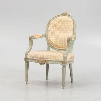 A Gustavian polychrome-painted open armchair, late 18th century.