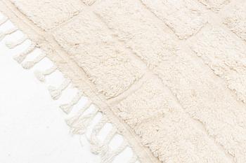 A Moroccan carpet, circa 308 x 181 cm.