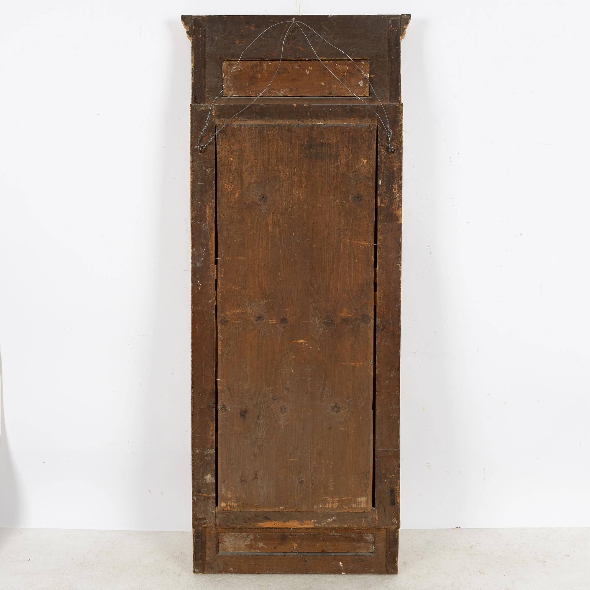 A Gustavian mirror, late 18th century.
