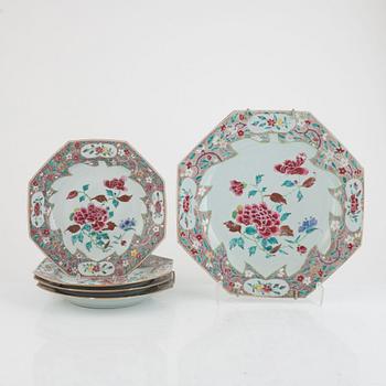A set of four porcelain Famille Rose plates and a dish, China, Qianlong (1736-95).