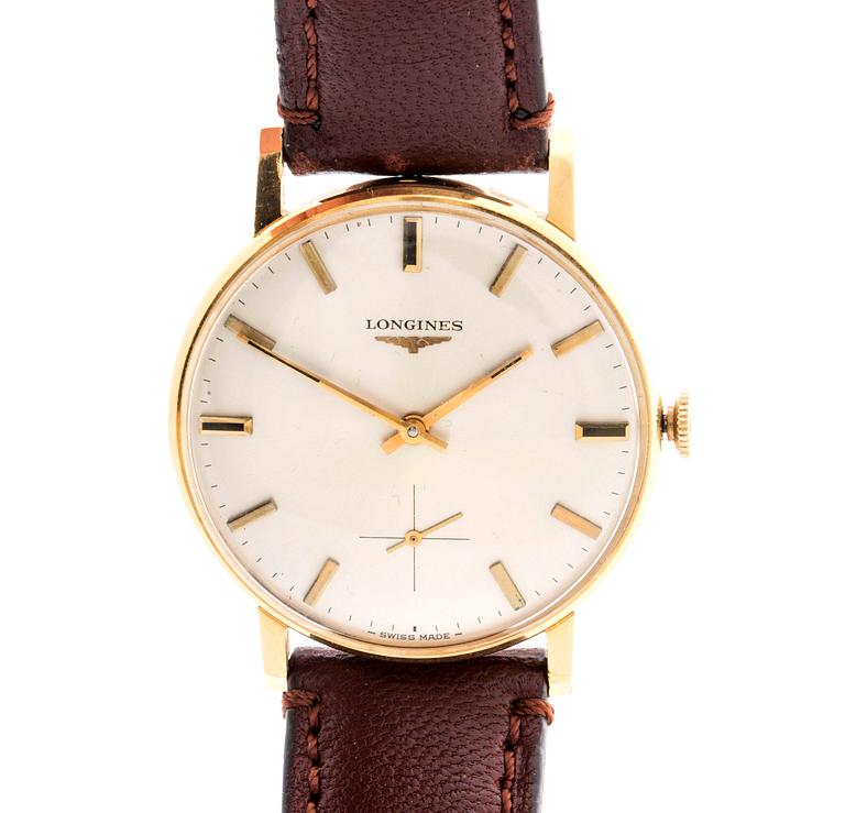 A Longines 18 ct gold wrist watch, ca 32 mm.