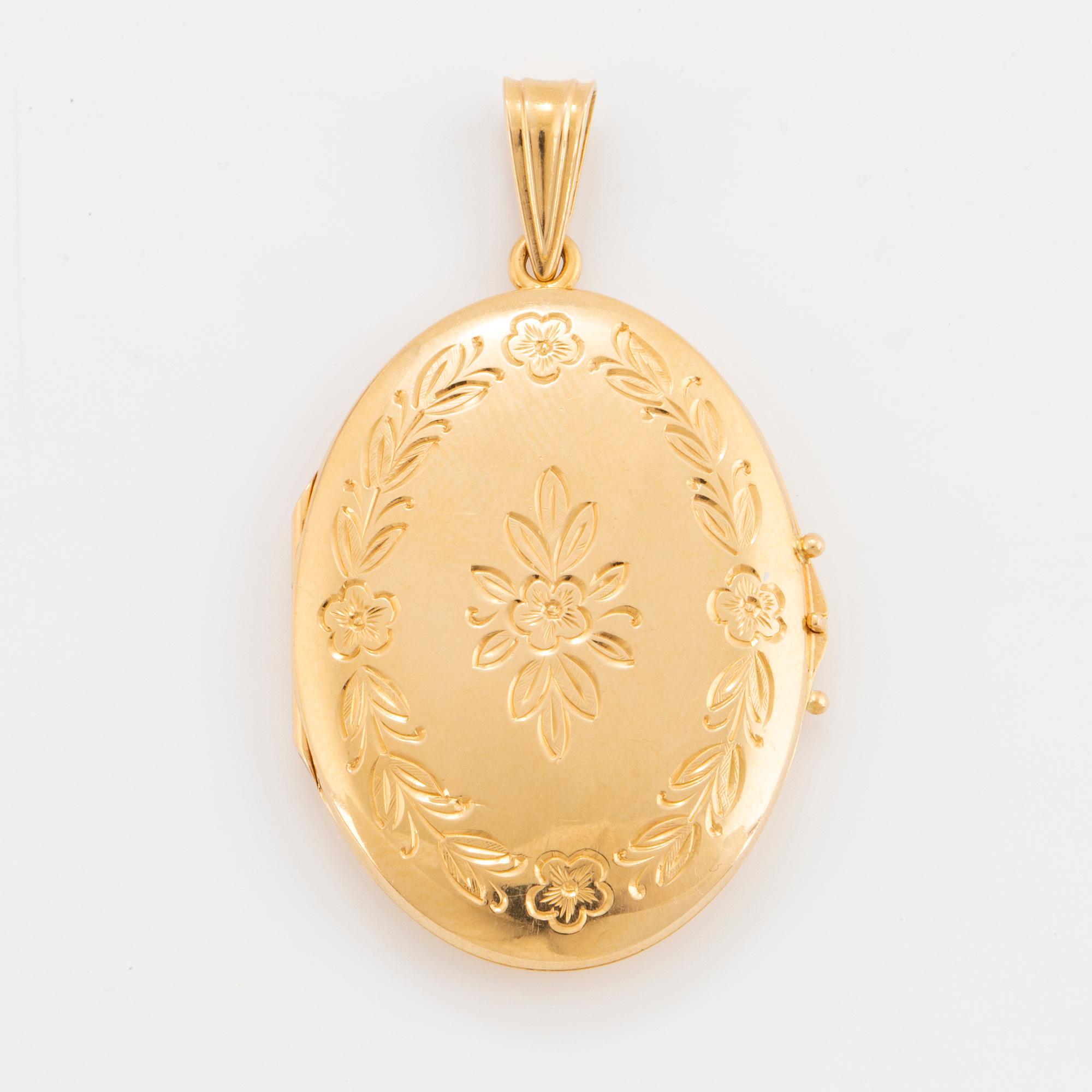 MEDALJONG, 18K guld.