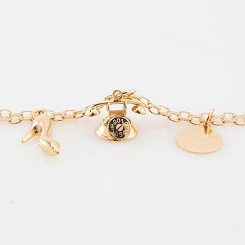 Bracelet 18K gold Bismarck link with charms.