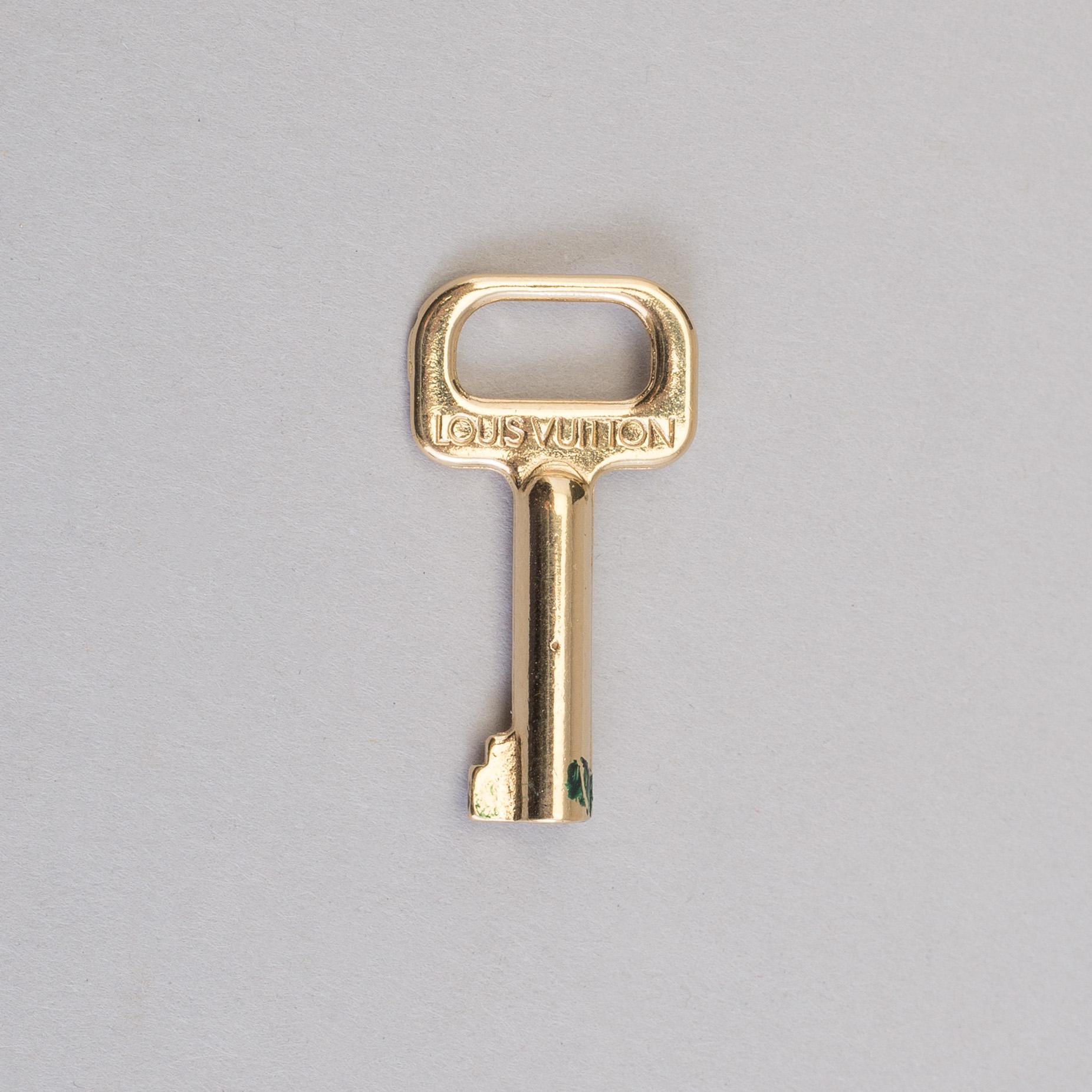 A Louis Vuitton green taiga Ambassador Briefcase.