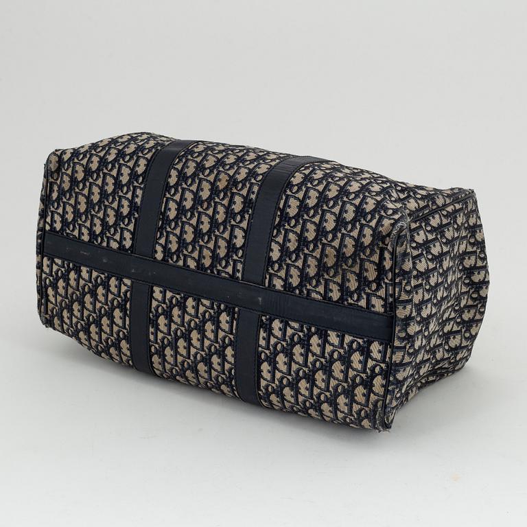 Christian Dior, a canvas 'Speedy' weekendbag and belt, size 85.