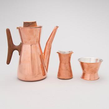 A late 20th Century Tapio Wirkkala four part copper and hardwood coffee set, Kultakeskus Finland.